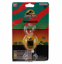 Load image into Gallery viewer, Jurassic Park 30th Anniversary Tamagotchi Dinosaur Amber Version