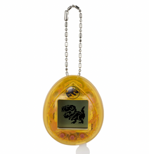 Load image into Gallery viewer, Jurassic Park 30th Anniversary Tamagotchi Dinosaur Amber Version
