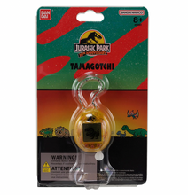 Load image into Gallery viewer, Jurassic Park 30th Anniversary Tamagotchi Dinosaur Amber Version
